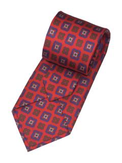 Red tie with purple  geometric pattern detail