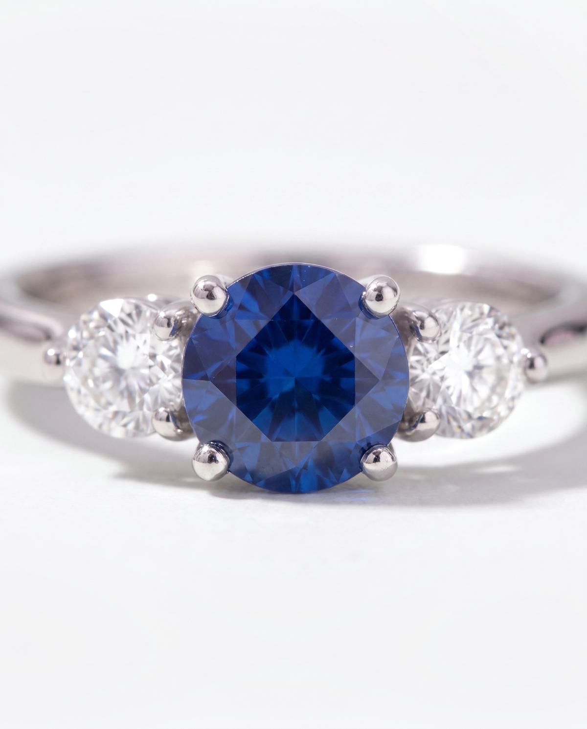 Blue Sapphire Solitaire, macro close-up of the blue sapphire and its setting