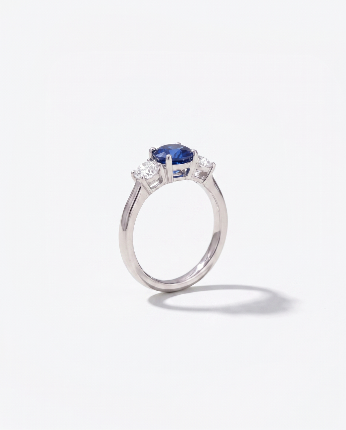 Blue Sapphire Solitaire, side profile view showing the band and setting height