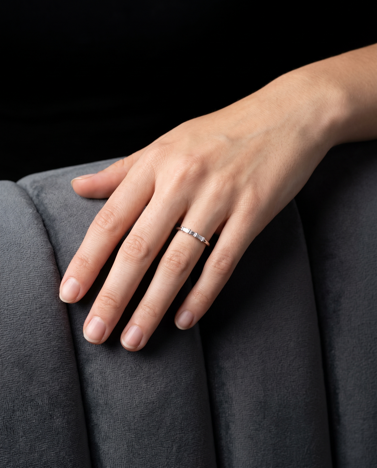 Diamond baguette ring worn on a model's hand