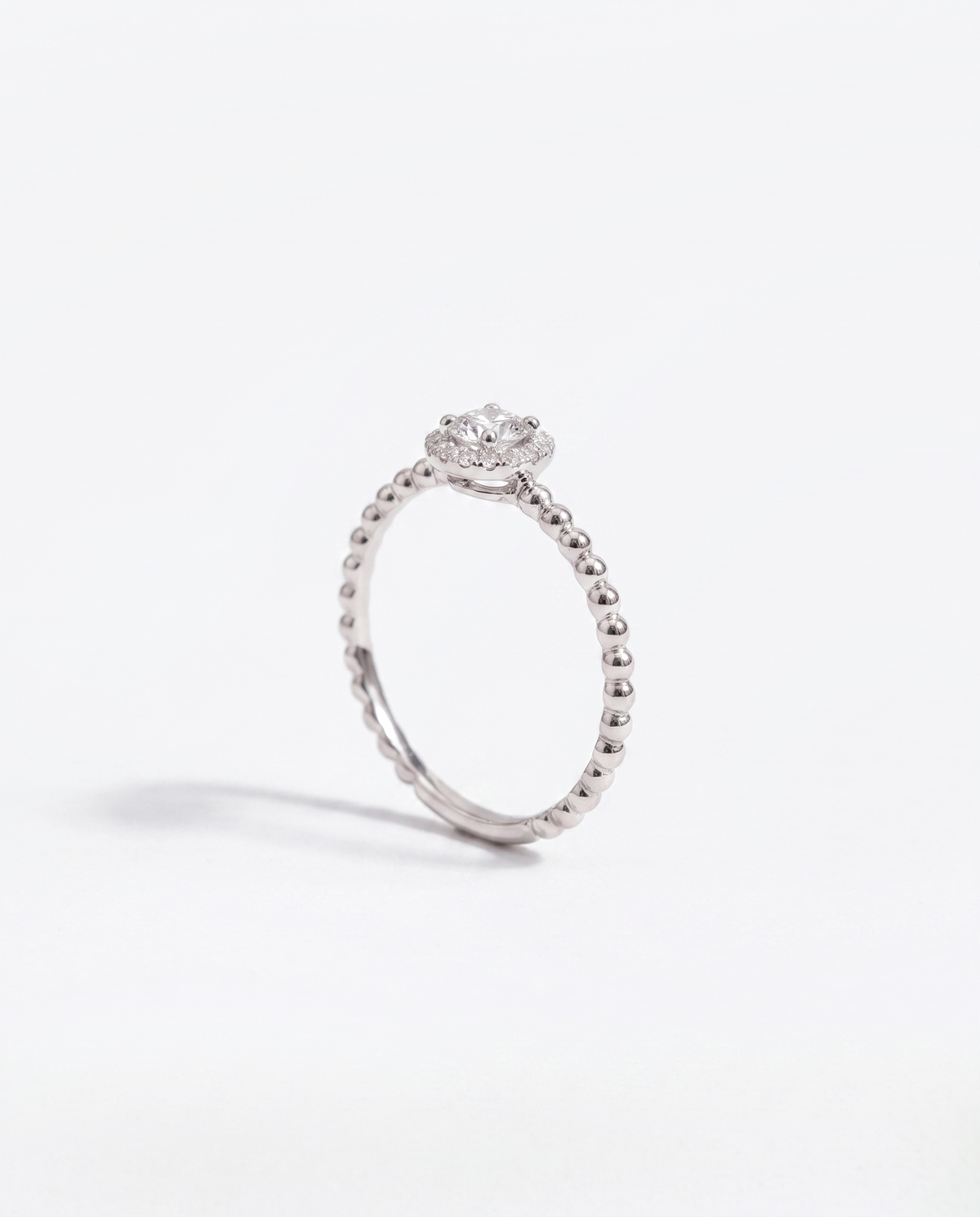 Diamond Solitaire, side profile view showing the band and setting height