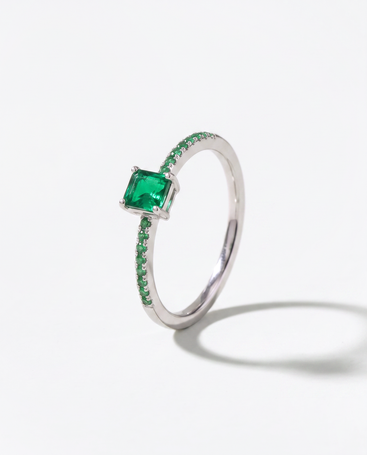 Emerald and Tsavorite ring, front hero view