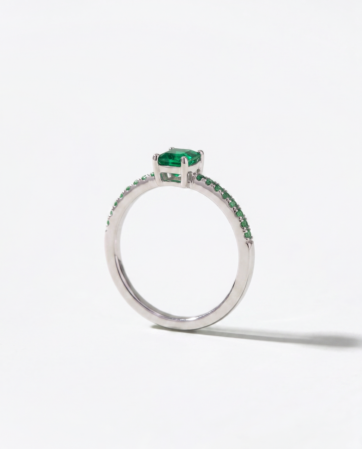 Emerald and Tsavorite ring, side profile view