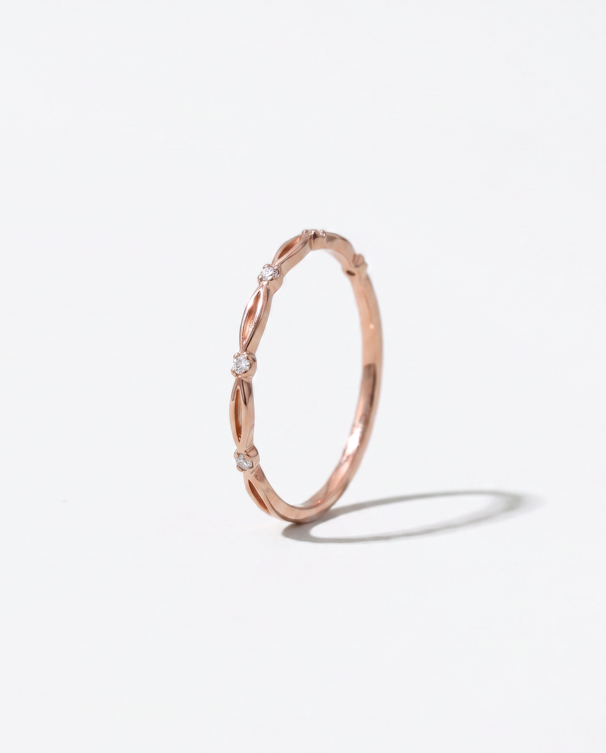 Four Brilliants ring, side profile view