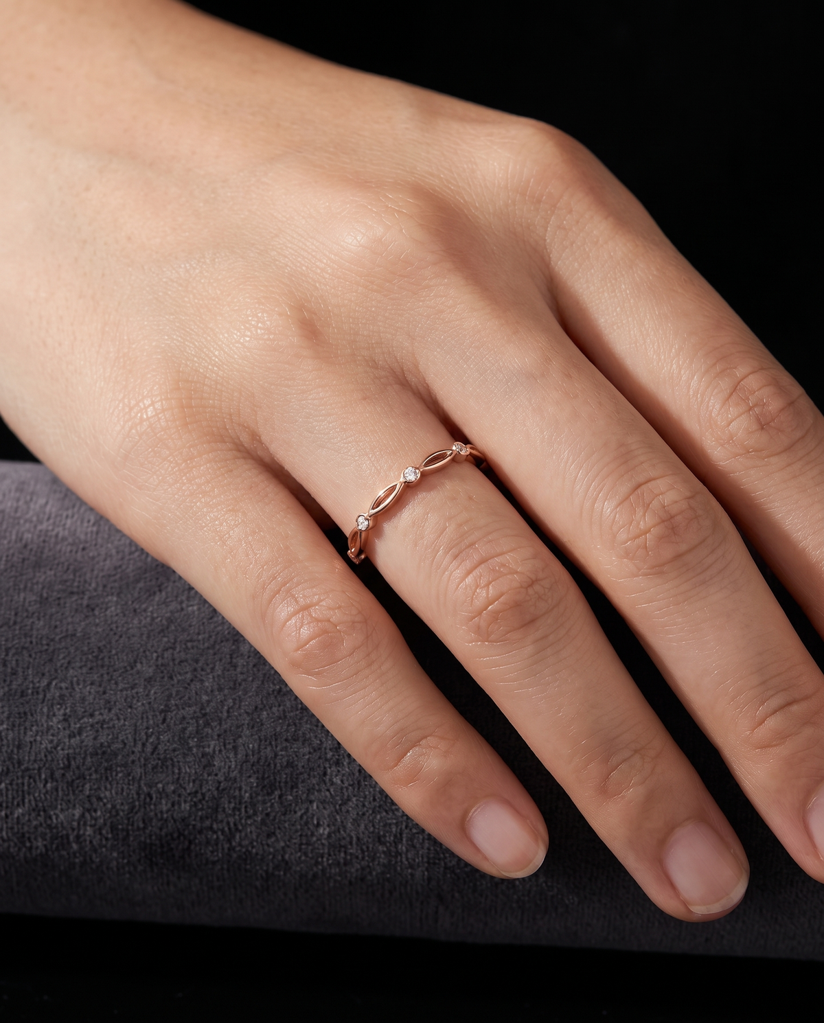 Four Brilliants ring, worn on a hand