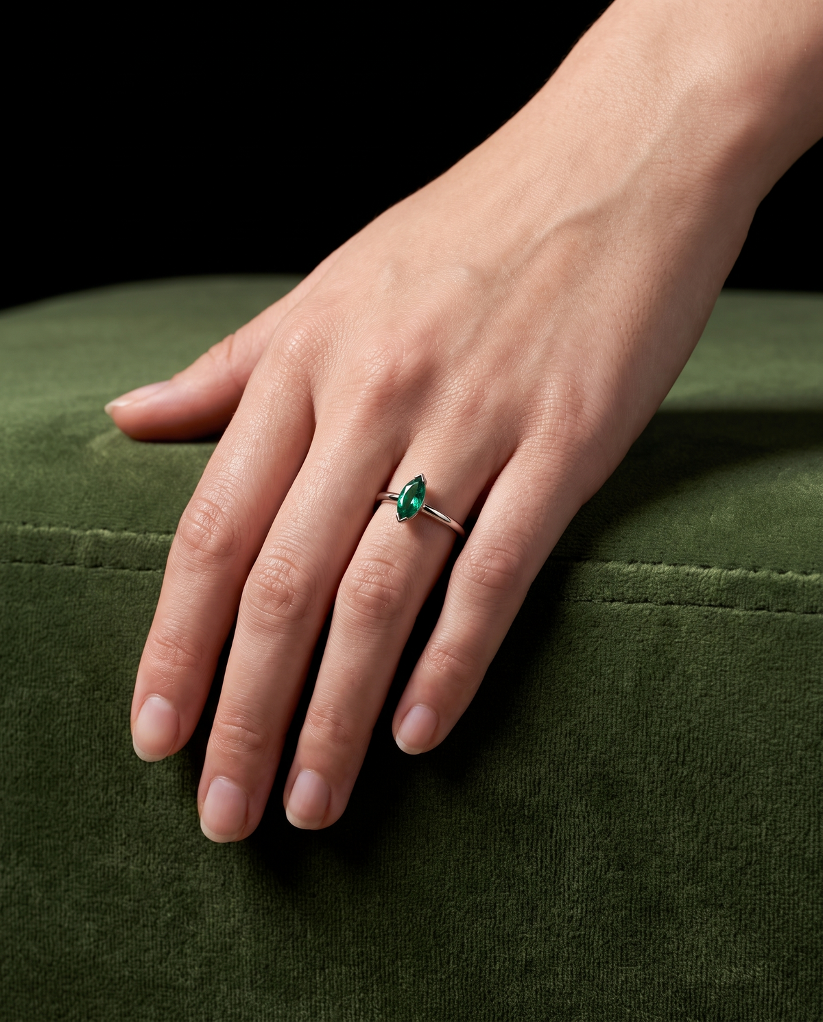 Marquise Emerald, ring worn on a hand