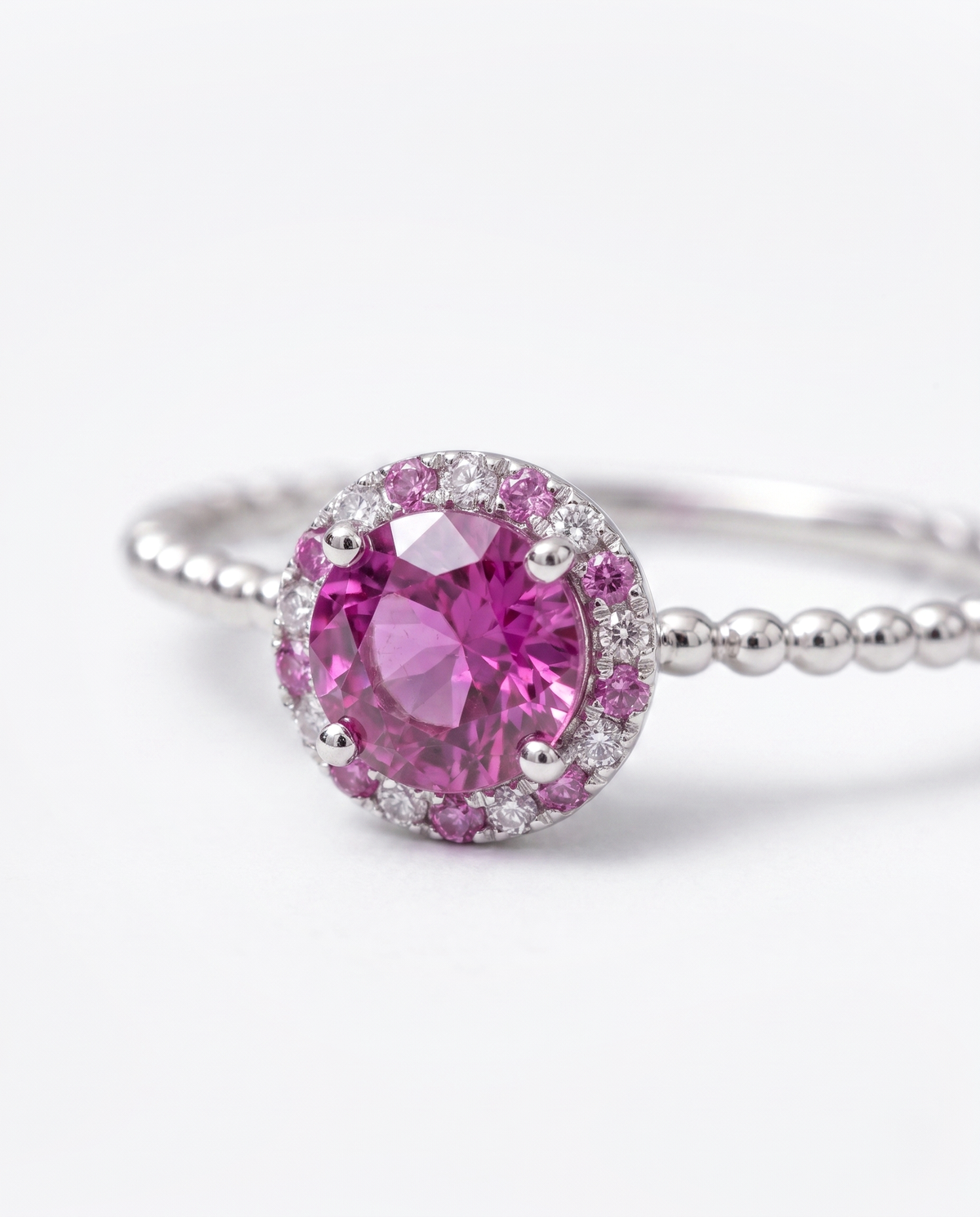 Pink Sapphire Halo, macro close-up of the centre stone and surrounding halo