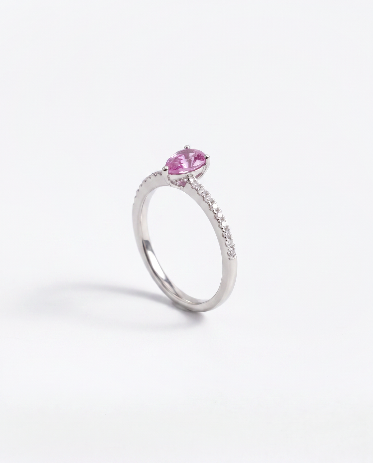 Pink Sapphire Pear, front hero view of the ring