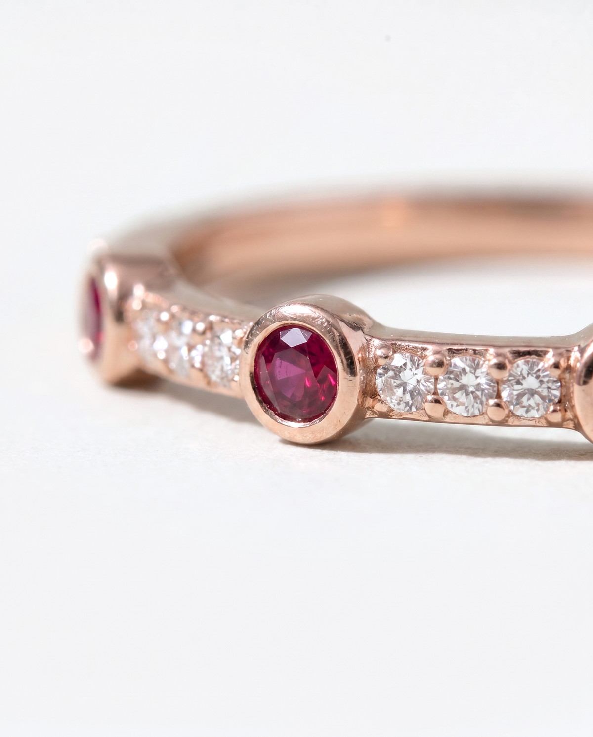Ruby Half-Eternity, close-up macro view of the stone setting
