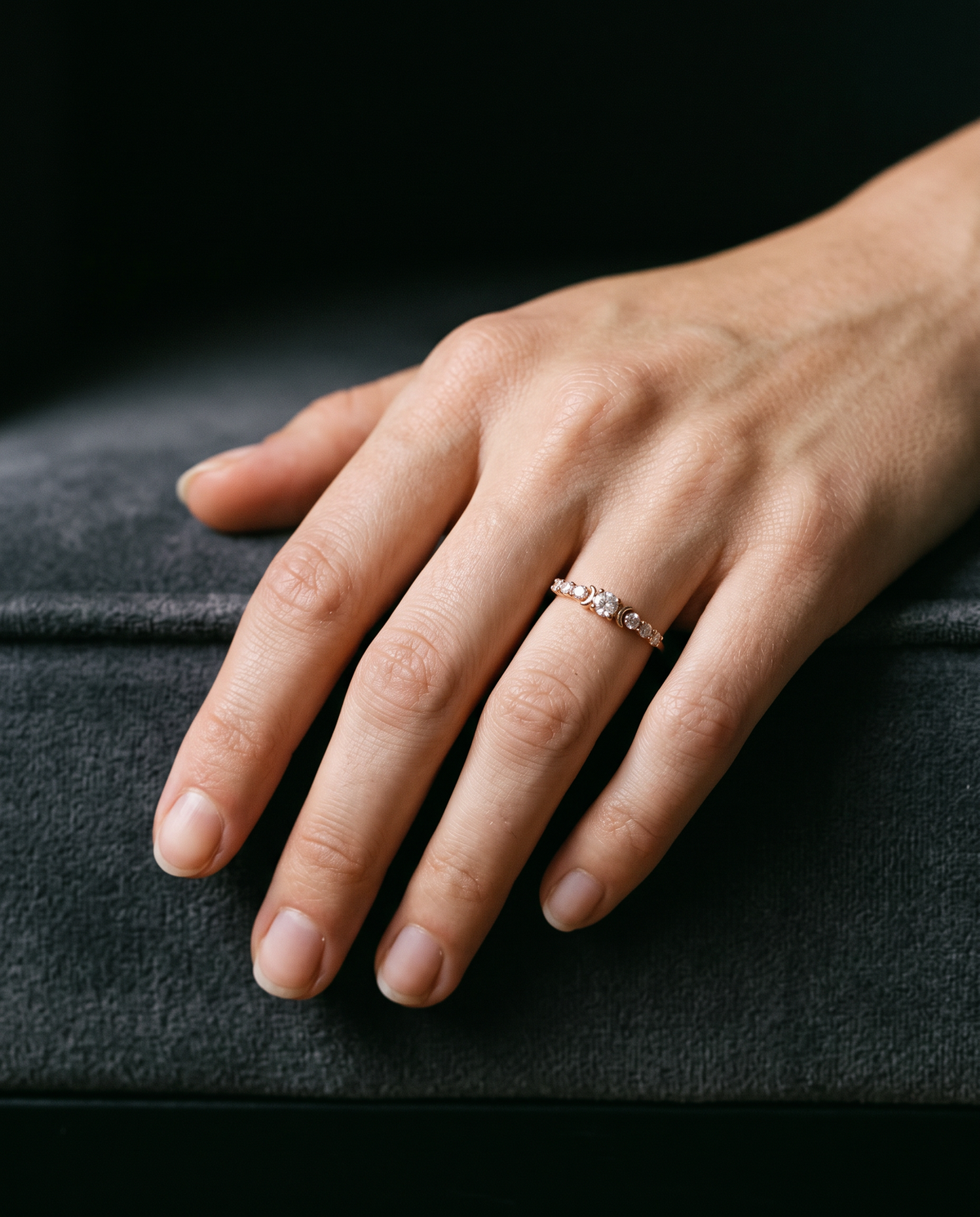 Seven Brilliants ring, worn on the hand
