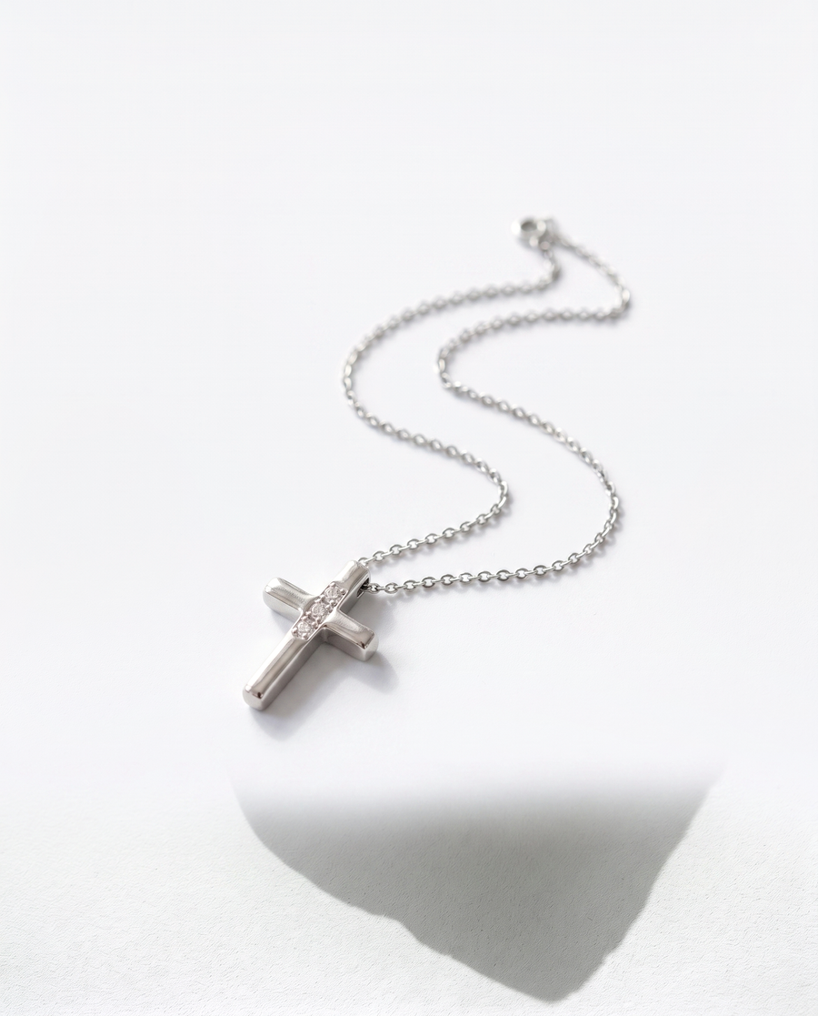 Small Cross pendant, front-facing hero view