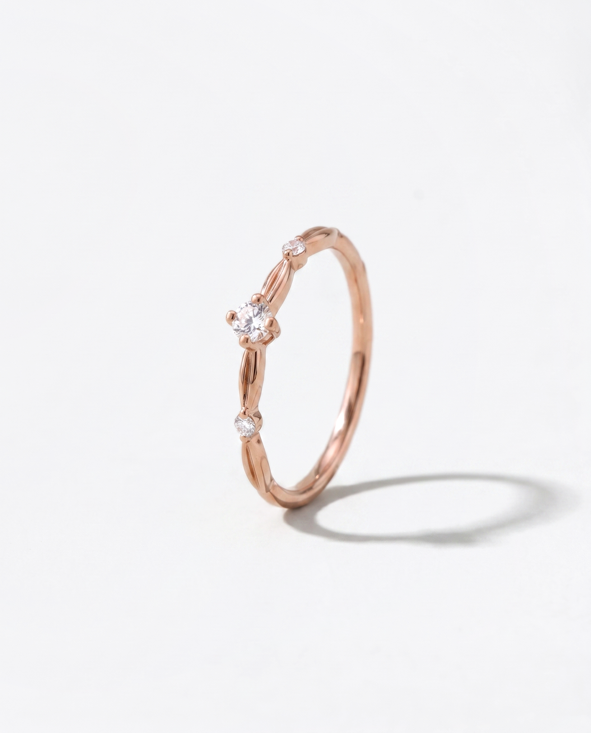 Three Brilliants ring, side profile view